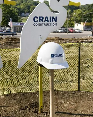 crain construction sign that is the shape of a bird outside