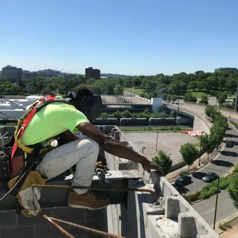 Crain construction worker on scaffolding at the element hotel job site
