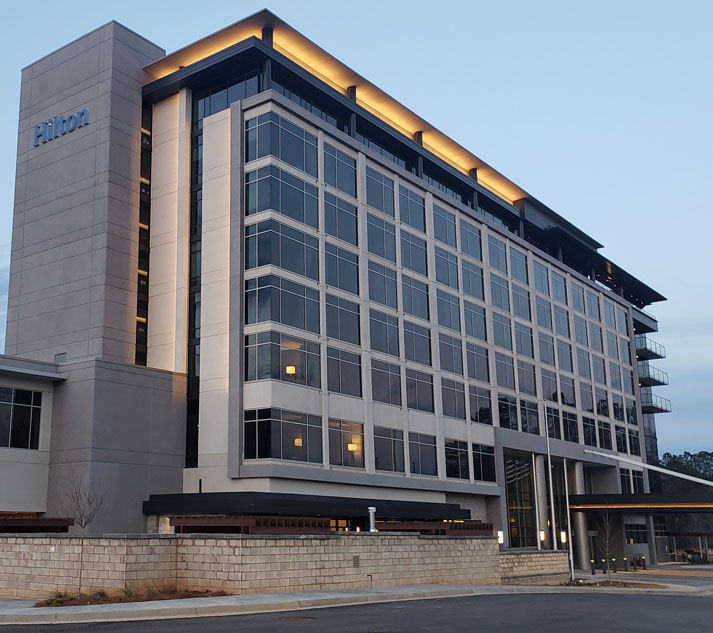 the outside of a modern hotel in Alpharetta Georgia
