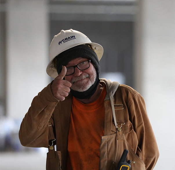 crain worker giving thumbs up