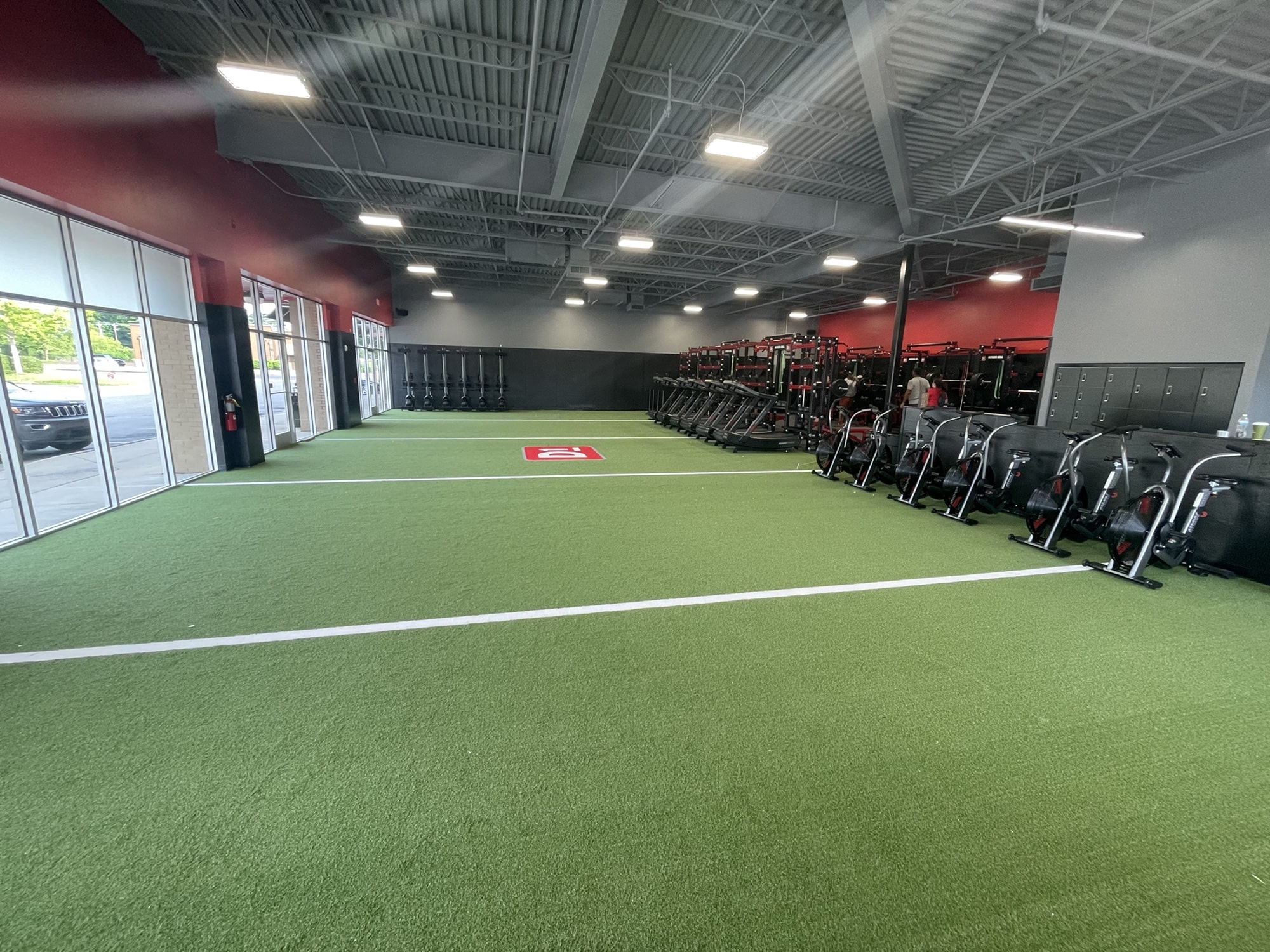 Wide shot of the turf field inside a D1 Training Facility in Spring Hill