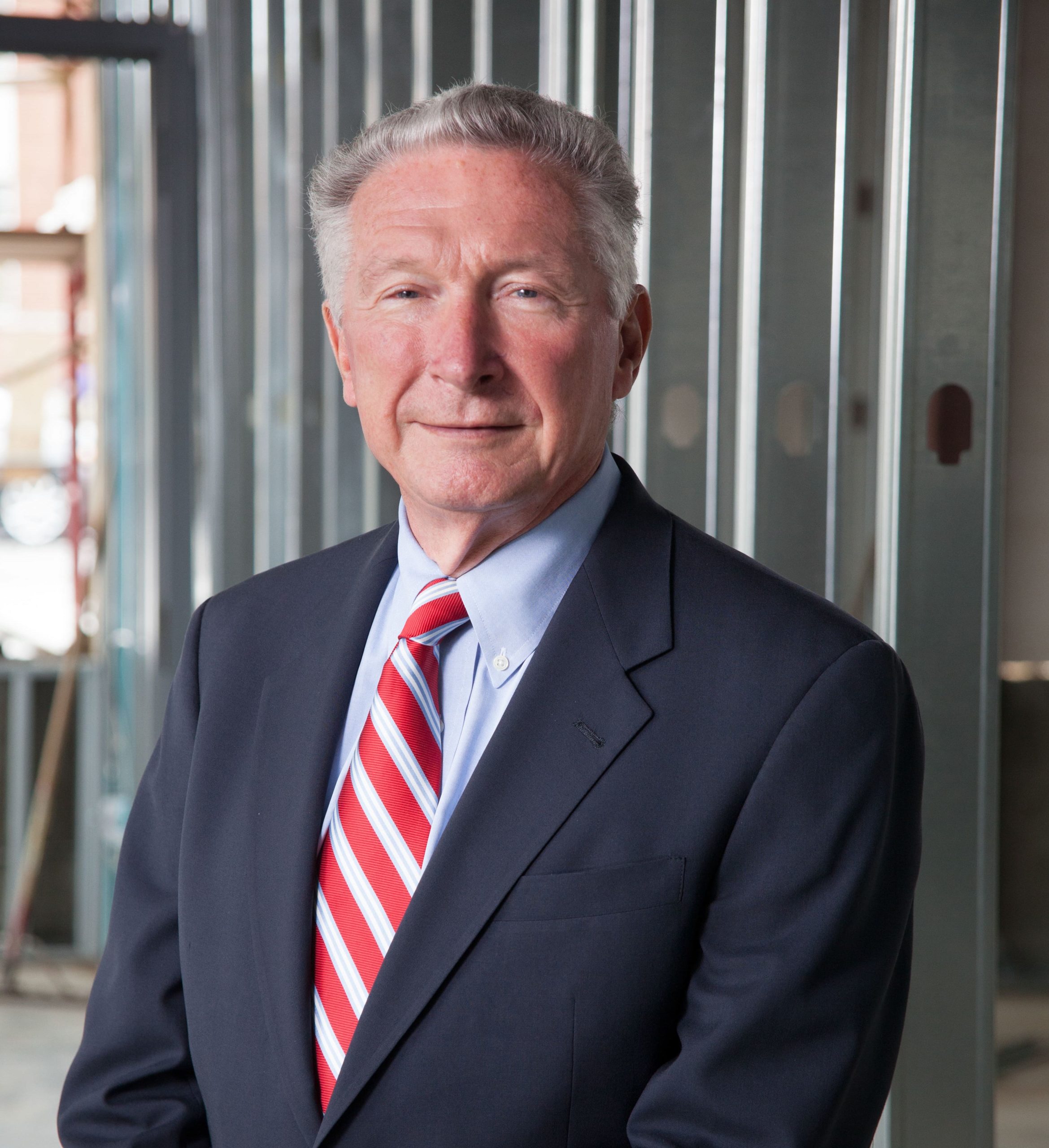 Lewis Rankina, a Crain Construction past CEO, in a professional portrait.