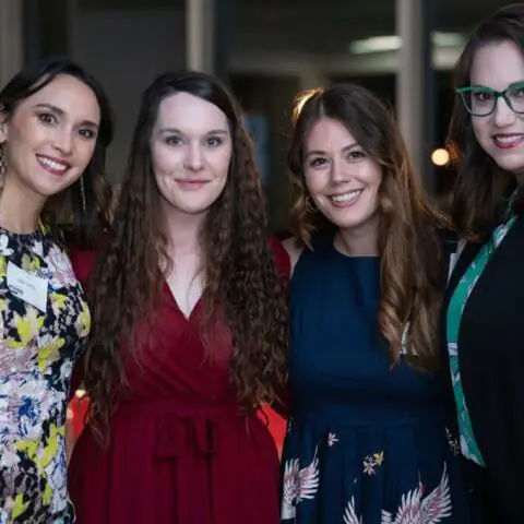 Crain Construction Employees Celebrating 90th Anniversary in Evening Wear