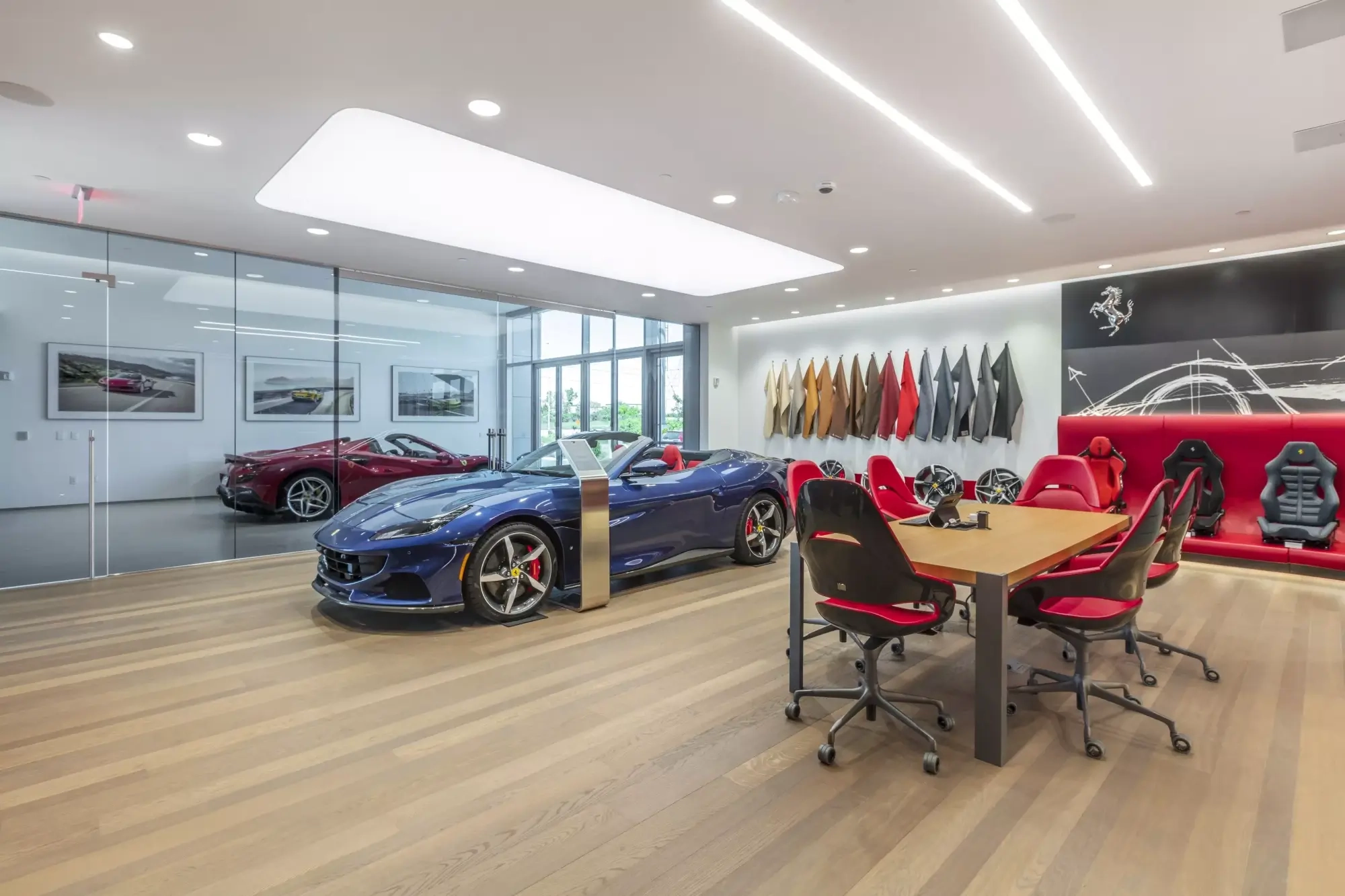 blue car at ferrari dealership showroom