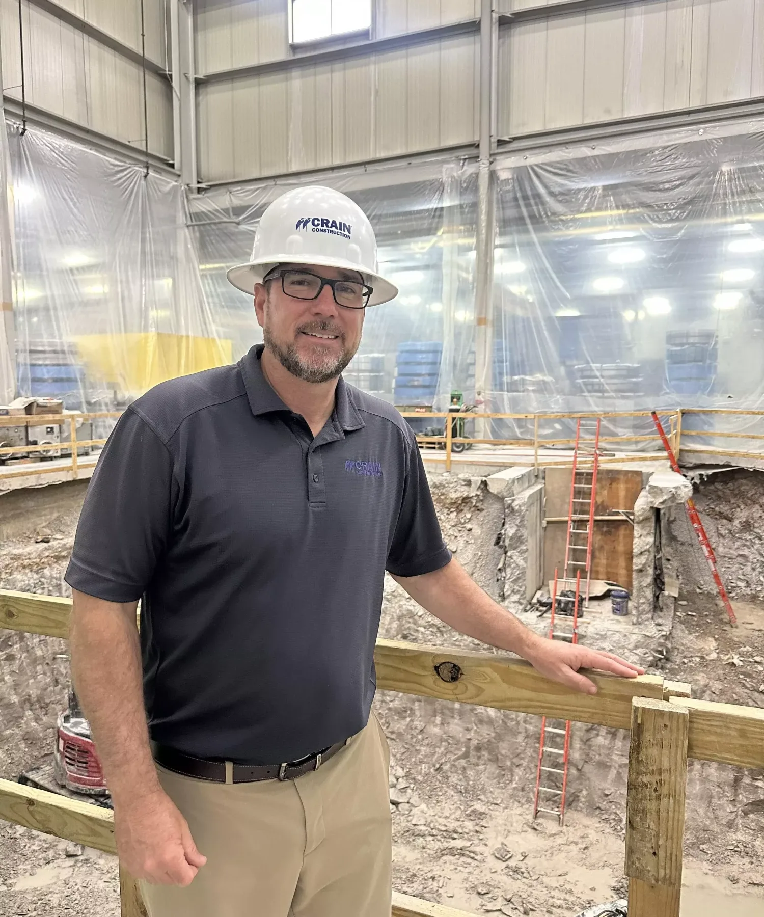 crain construction employee on site at feintool construction project