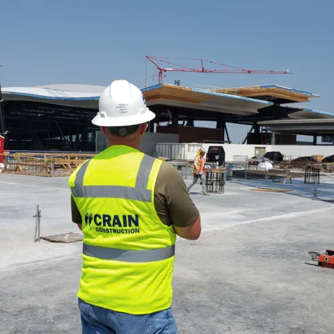 crain construction worker on job site