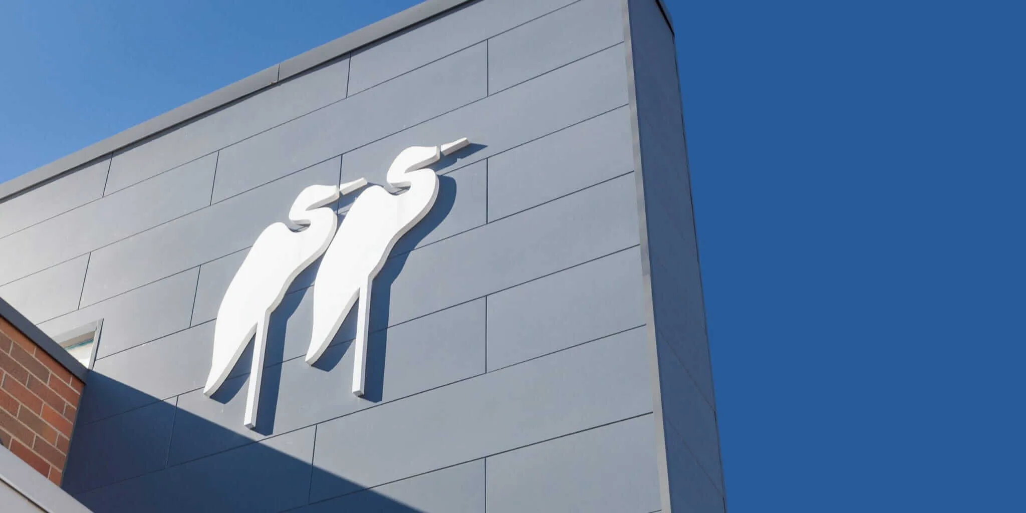 crain construction logo on building