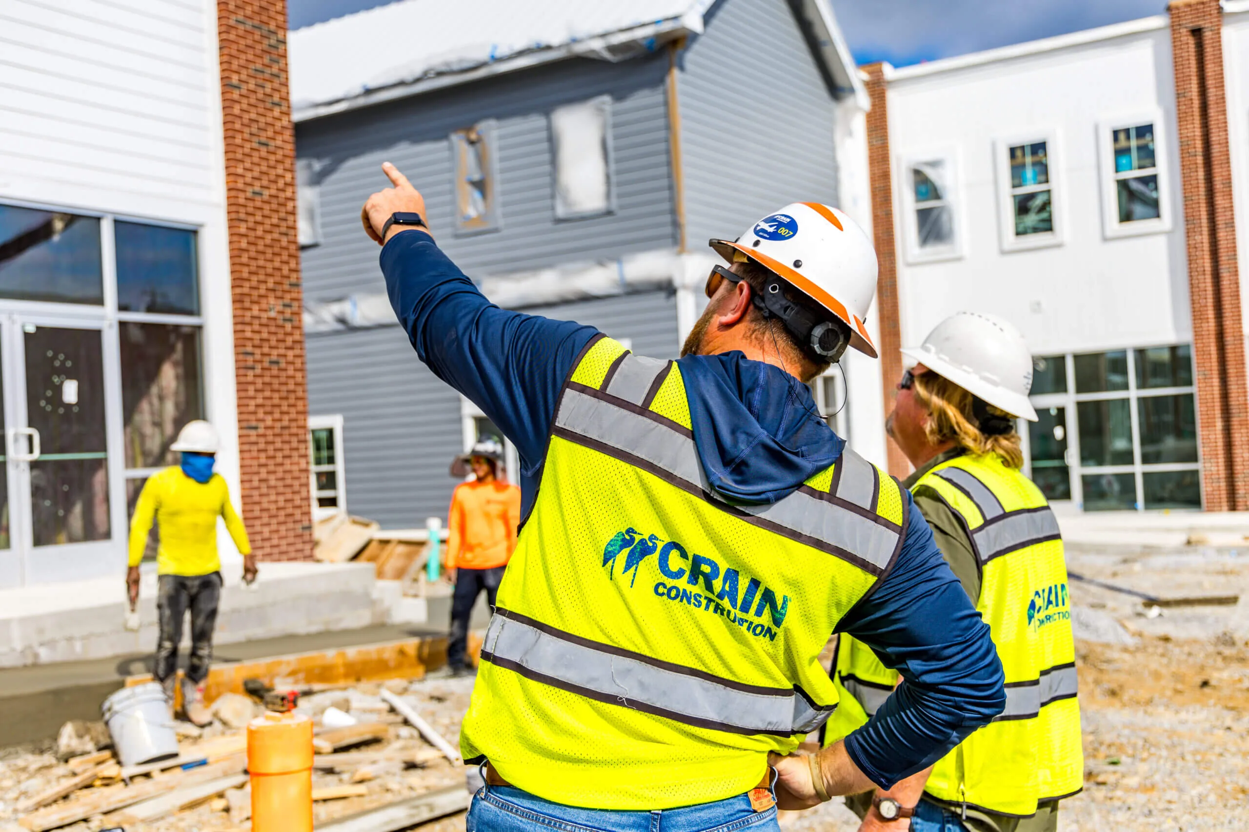 Crain Construction Workers planning on construction site